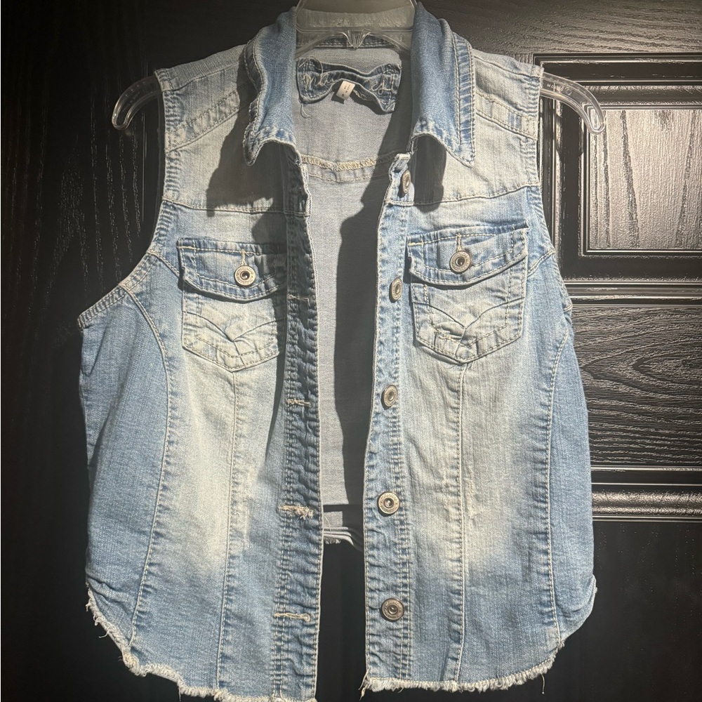 Maurice’s distressed Jean vest